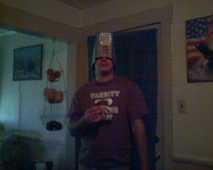 my boyfriend CHRIS being silly with a 12 pack box on his head