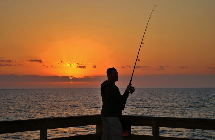One of our Marines Fishing from our Pier