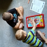 The boys playing Operation