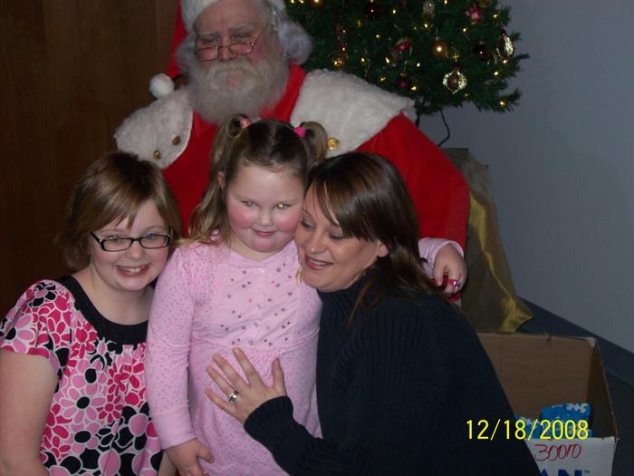 me and my girls with santa