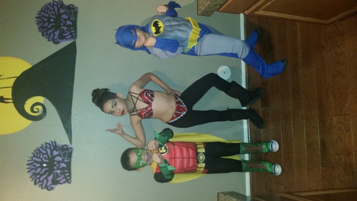 Batman and Robin protecting Selena lol