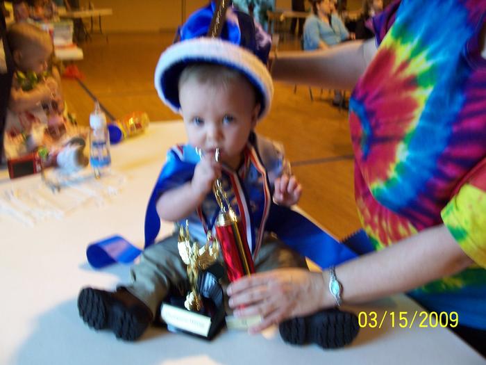 Jacob after getting his crown and trophies