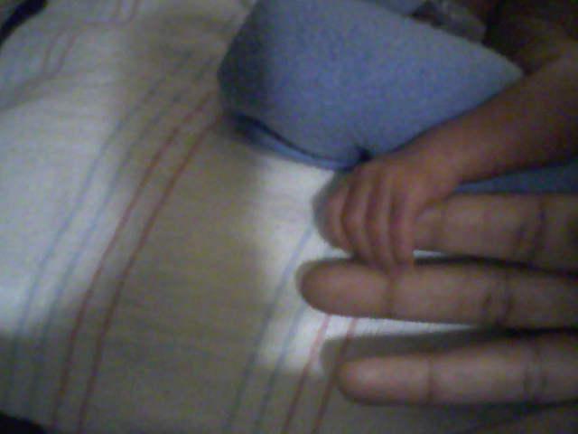 Lil Man holding mommy's hand