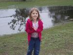 we were throwing rocks in flooded grass at daddy's softball game.