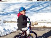 My son Alonzo riding his new bike.