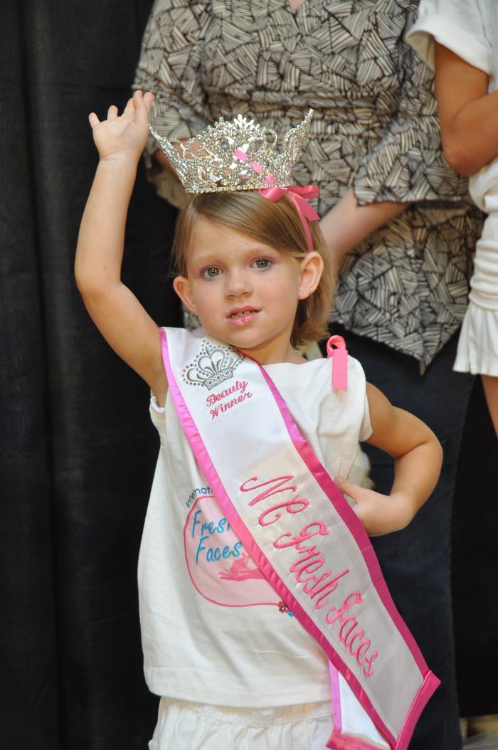 Ky was so excited she raised her hand up when she won! 