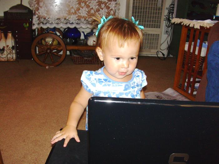 Meagan is watching cartoons on her Grandpa's Laptop 2009