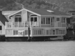 A greyscaled version of a houseboat
