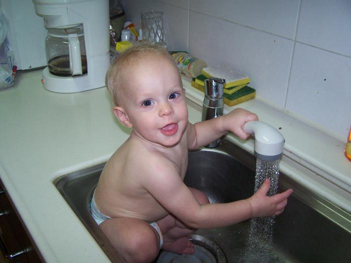 Helping mommy with dishes