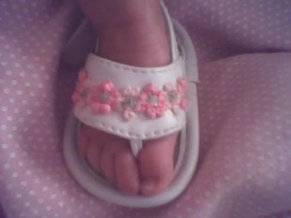 Her tiny sandals finally fit!