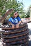 Miranda being constricted by a snake